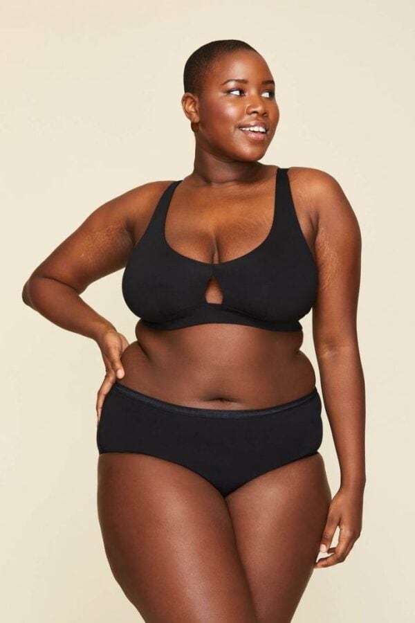 a woman wearing a plus-size organic underwear