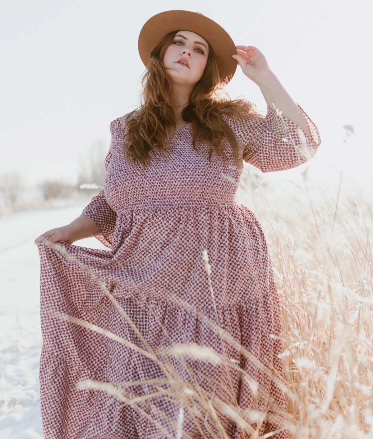 a woman wearing an organic cotton plus size dress from Christy Dawn