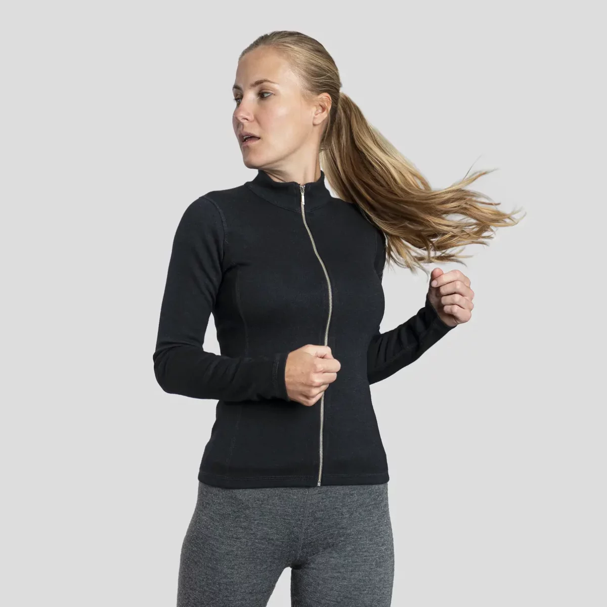 a woman wearing a plastic free activewear from arms of andes