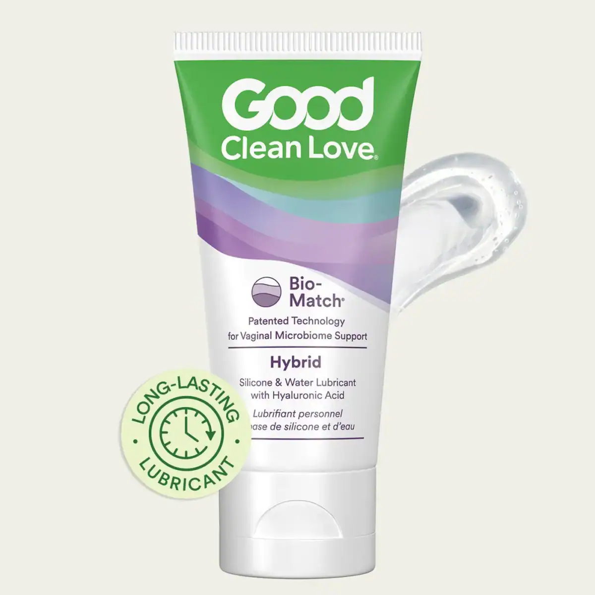 A green and white squeeze tube of Good Clean Love "Hybrid" Silicone & Water Lubricant is displayed with a swirl of the clear product and a round "Long-Lasting Lubricant" seal.