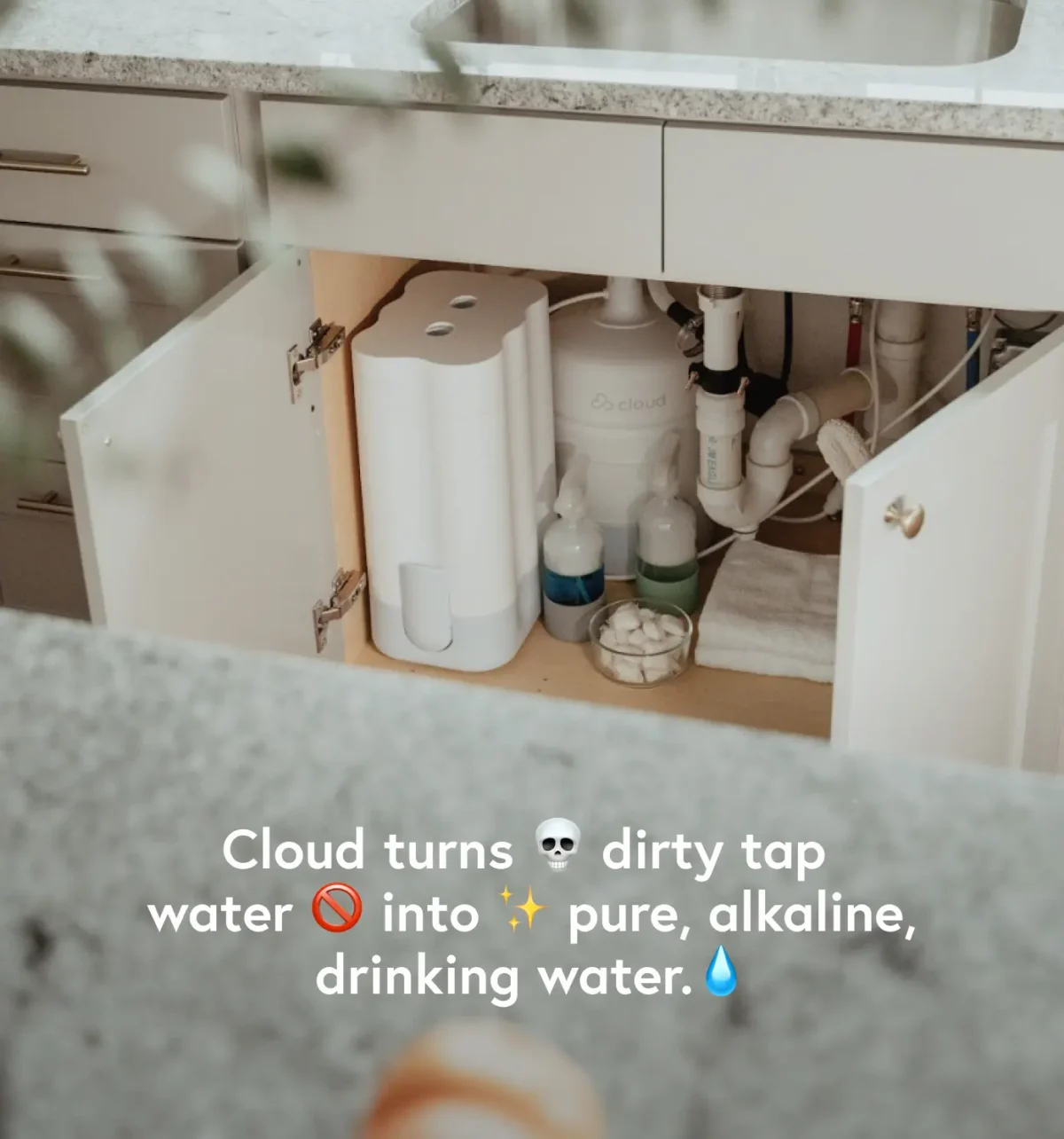 The image shows a Cloud water filtration system installed under a kitchen sink, accompanied by text stating that it turns dirty tap water into pure, alkaline drinking water.